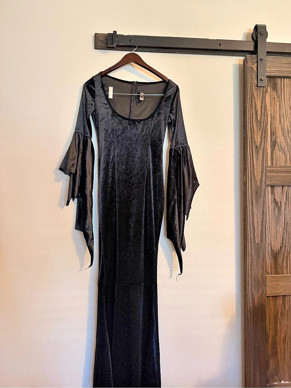 Black & White- Like New 
Halloween costumes- Morticia Adam’s.